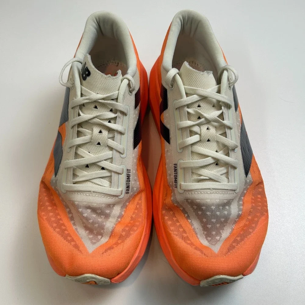 New Balance FuelCell Rebel v4 Mens 11 Wide 2E Orange White Running Shoes MFCXCO4
